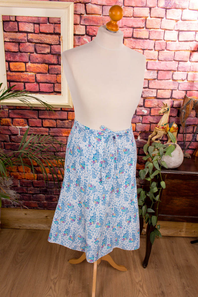 70s Hippierock blau Blumen 70er blau bunt Disco Frau L 44-46 Rockabilly Schlager vintageberlin.de