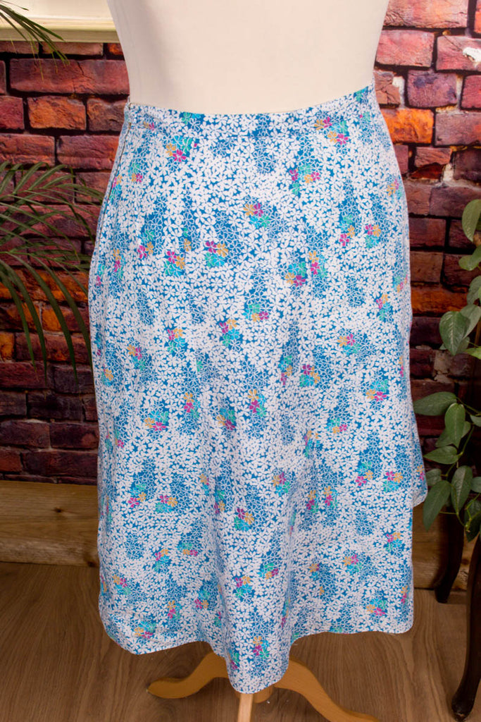 70s Hippierock blau Blumen 70er blau bunt Disco Frau L 44-46 Rockabilly Schlager vintageberlin.de