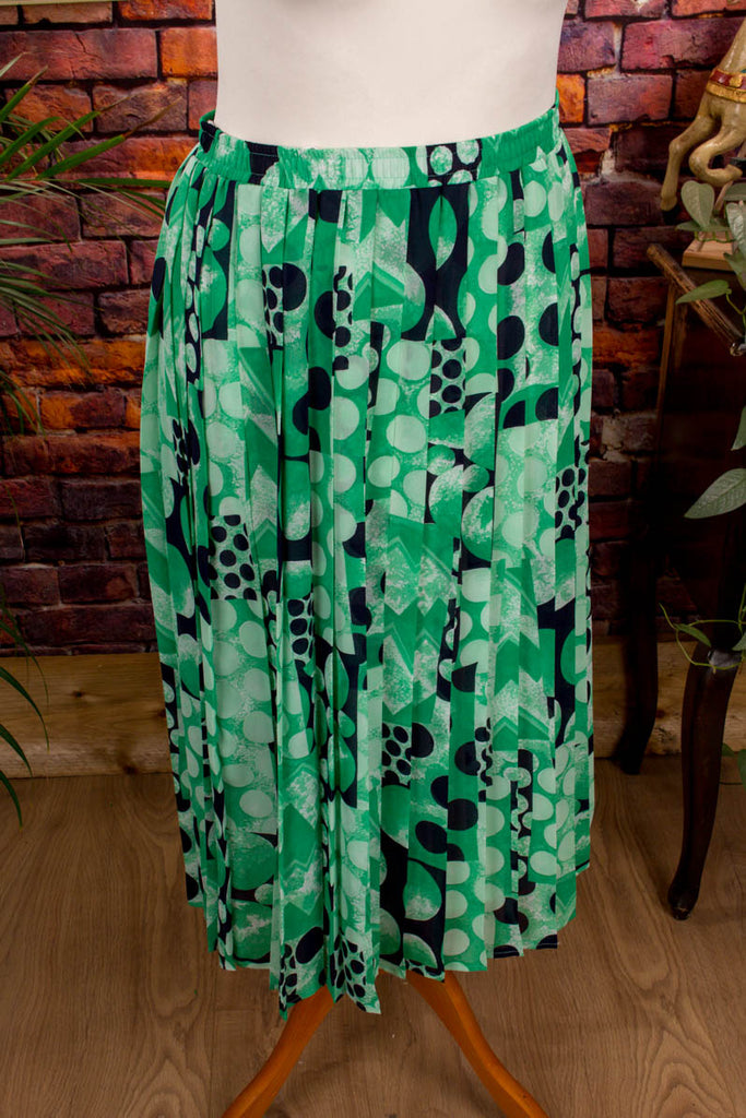 Vintage Faltenrock grün Muster 80er 90er Frau grün M 40-42 Sekretärin vintageberlin.de