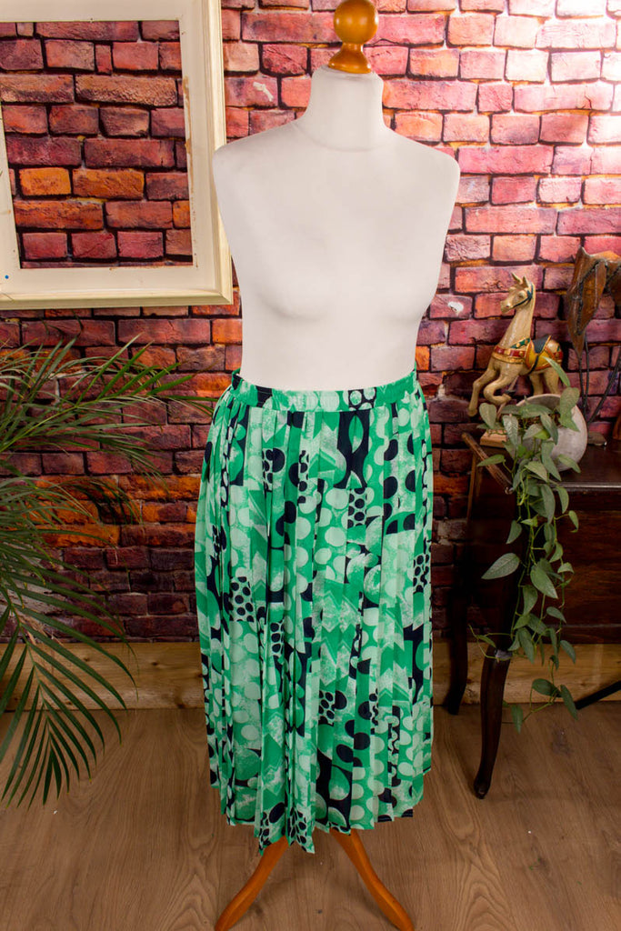 Vintage Faltenrock grün Muster 80er 90er Frau grün M 40-42 Sekretärin vintageberlin.de