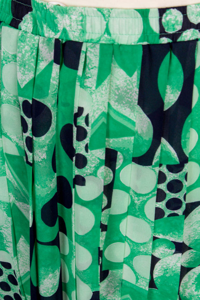 Vintage Faltenrock grün Muster 80er 90er Frau grün M 40-42 Sekretärin vintageberlin.de