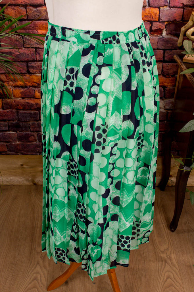 Vintage Faltenrock grün Muster 80er 90er Frau grün M 40-42 Sekretärin vintageberlin.de