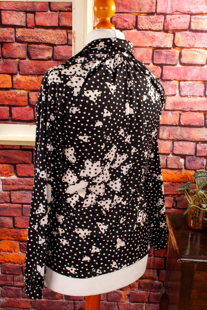 Pünktchenbluse schwarz-weiß