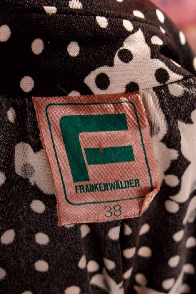 Pünktchenbluse schwarz-weiß