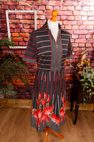 70s Kleid schwarz Punkte Megakragen