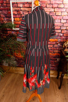 70s Kleid schwarz Punkte Megakragen