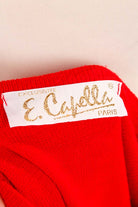 roter Pulli mit Glitzer-Elefanten