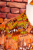 70s Schlagerkleid orange