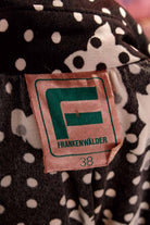 Pünktchenbluse schwarz-weiß
