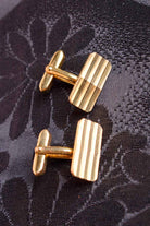 Manschettenknöpfe goldfarben