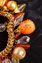 70s Bettelarmband gold Marienkäfer