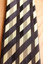Krawatte schwarz gold Streifen