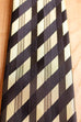 Krawatte schwarz gold Streifen