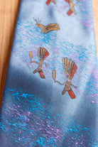 blaue Krawatte Höhlenmalerei