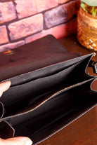 70s Ledertasche schwarz schlicht