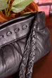 kleine Handgelenktasche schwarz Leder