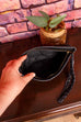 kleine Handgelenktasche schwarz Leder