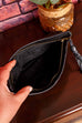 kleine Handgelenktasche schwarz Leder