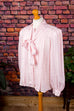 rosa Schluppenbluse mit Glitzer